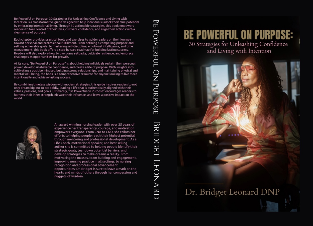 Book cover with a woman sitting at a desk, smiling, with a window behind her, titled 'Be Powerful on Purpose'.