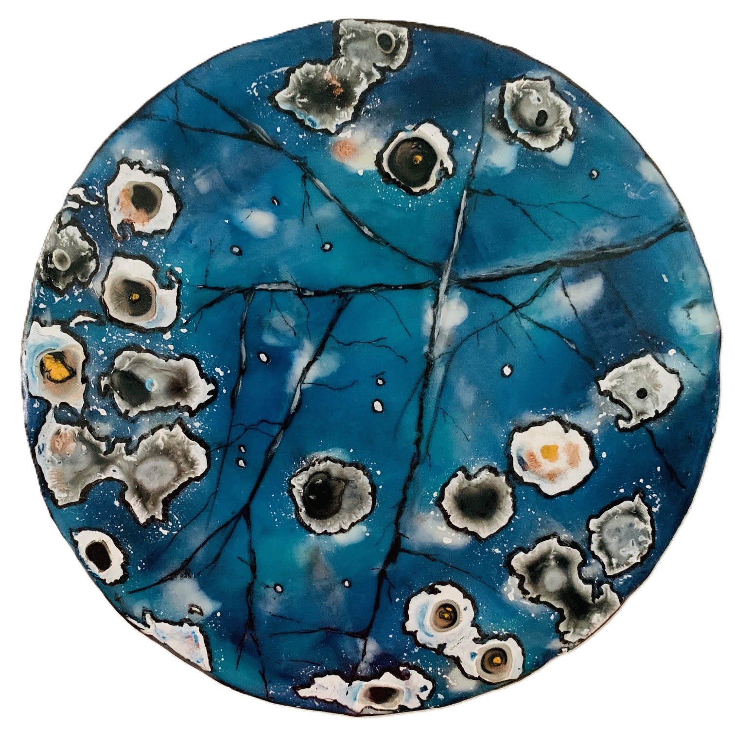 Round clock with a blue and black abstract pattern, resembling a marbled or mineral design.
