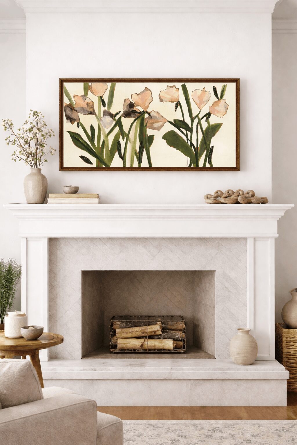 White fireplace with a painting of flowers above, decorated with vases and small objects, in a bright room.