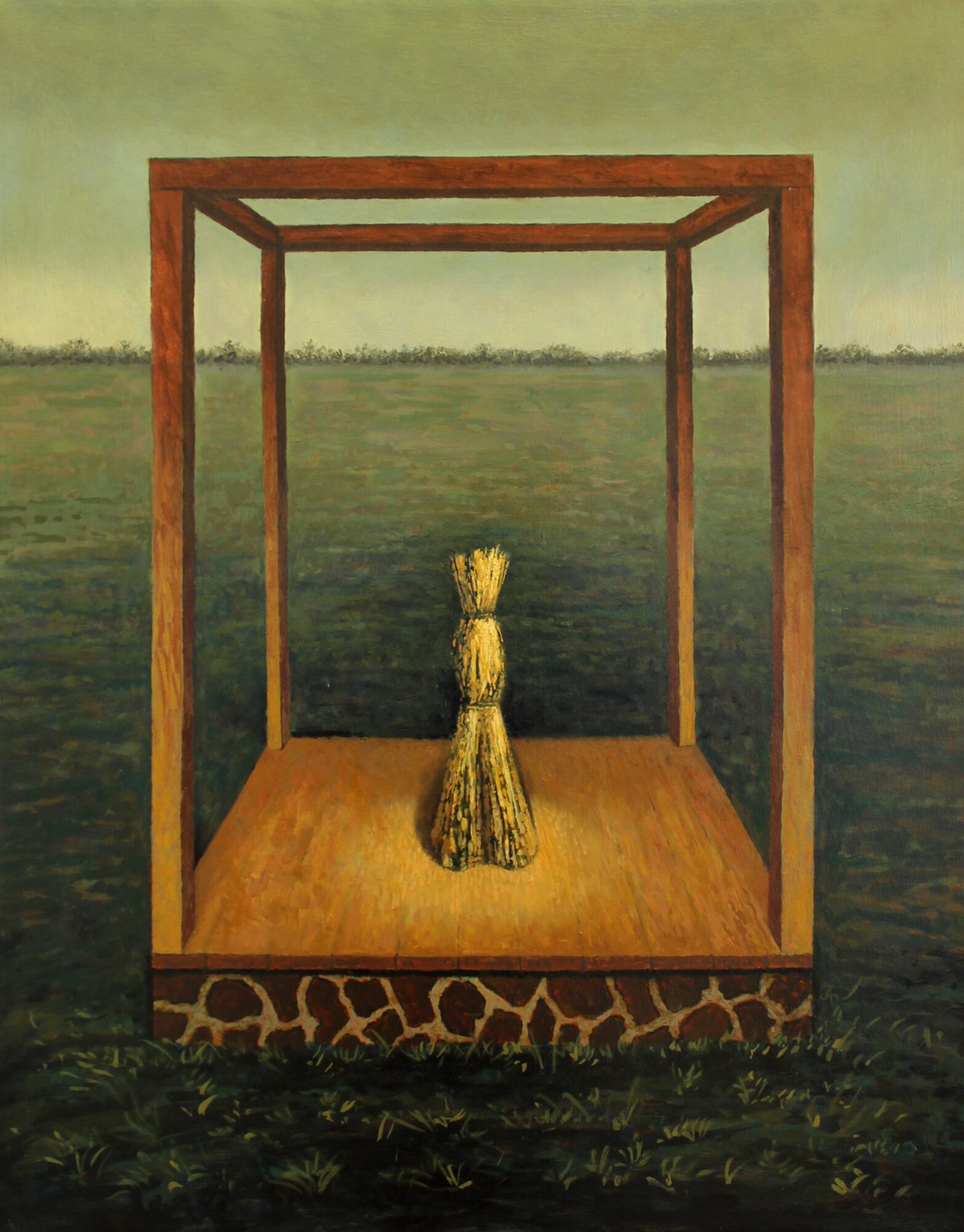 A broom stands inside a wooden frame on a grassy field with a cloudy sky background.