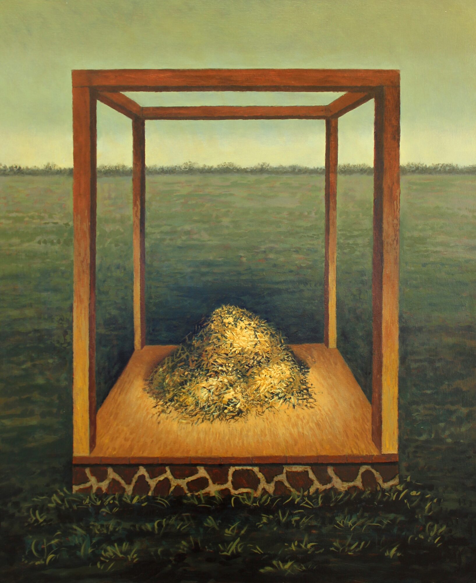 A wooden structure with a pile of hay or straw inside, set in a grassy field with a distant horizon and sky.