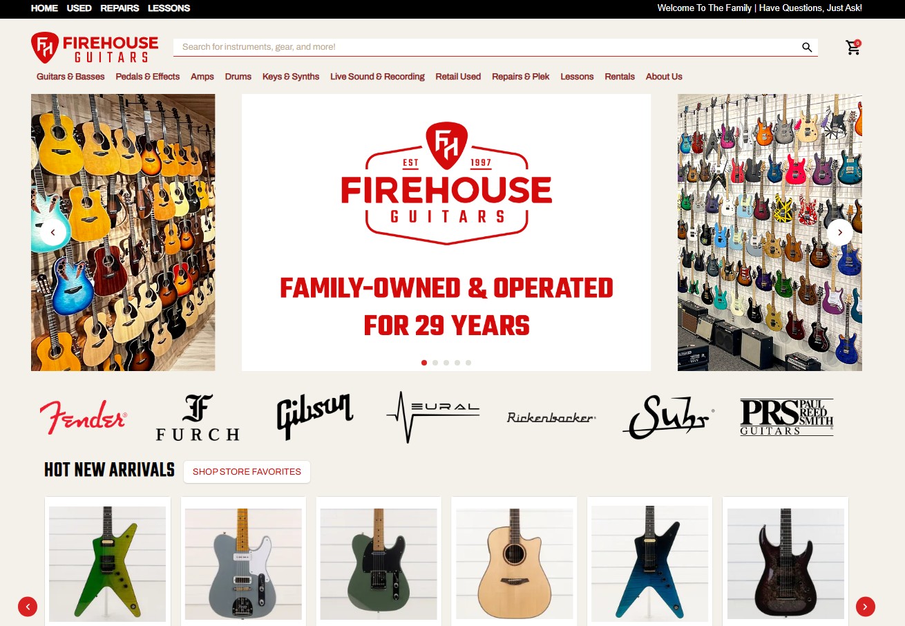 Display of guitars on wall, with a central logo and text about family-owned business for 29 years, and new arrivals of guitars below.