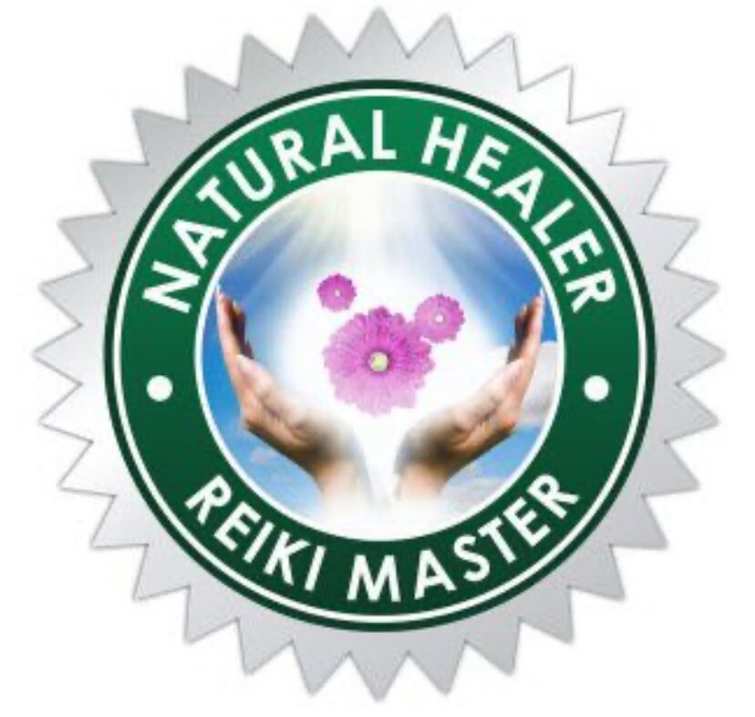 A circular badge with green and white text reading 'Natural Healer Reiki Master' surrounds a pair of hands holding pink flowers against a blue sky.