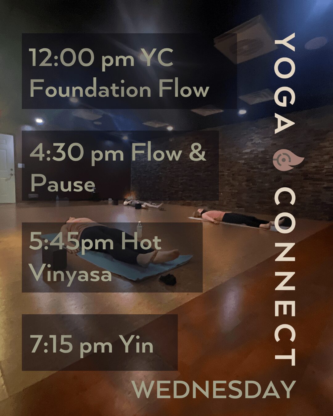 Yoga class schedule on a wall with times and activities listed, including foundation flow, flow and pause, hot vinyasa, and yin.