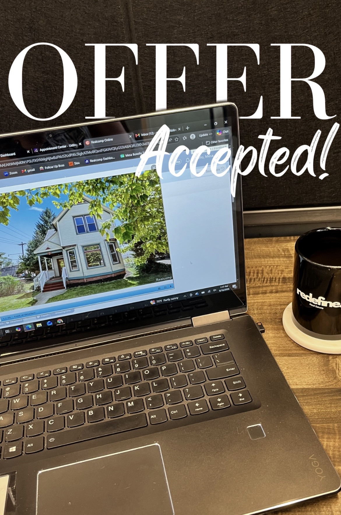 Laptop displaying a house image, with a sign reading 'OFFER Accepted!' behind, and a coffee mug nearby.