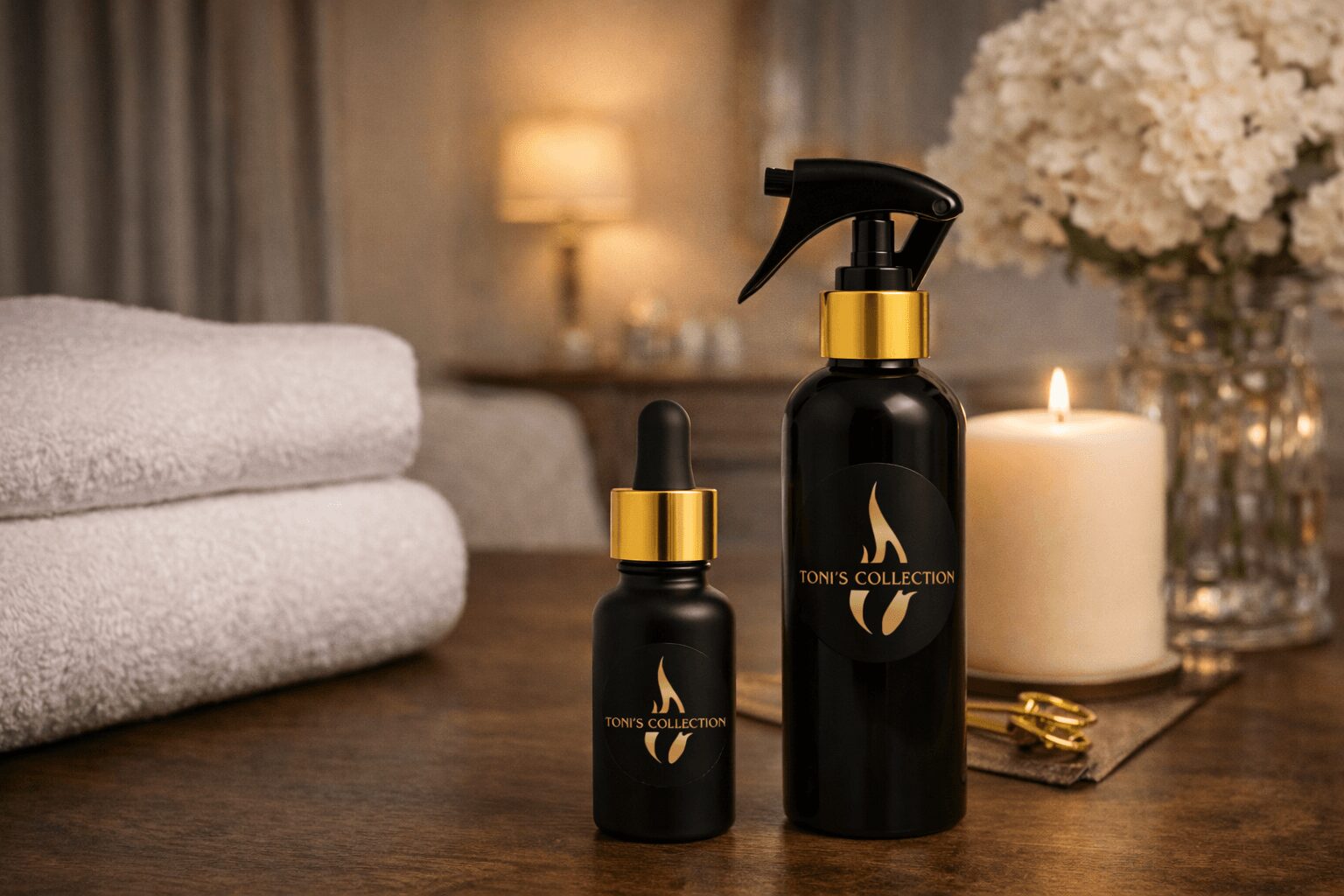 Two black bottles with gold caps and droppers on a wooden surface, surrounded by towels, candles, and flowers in a cozy setting.
