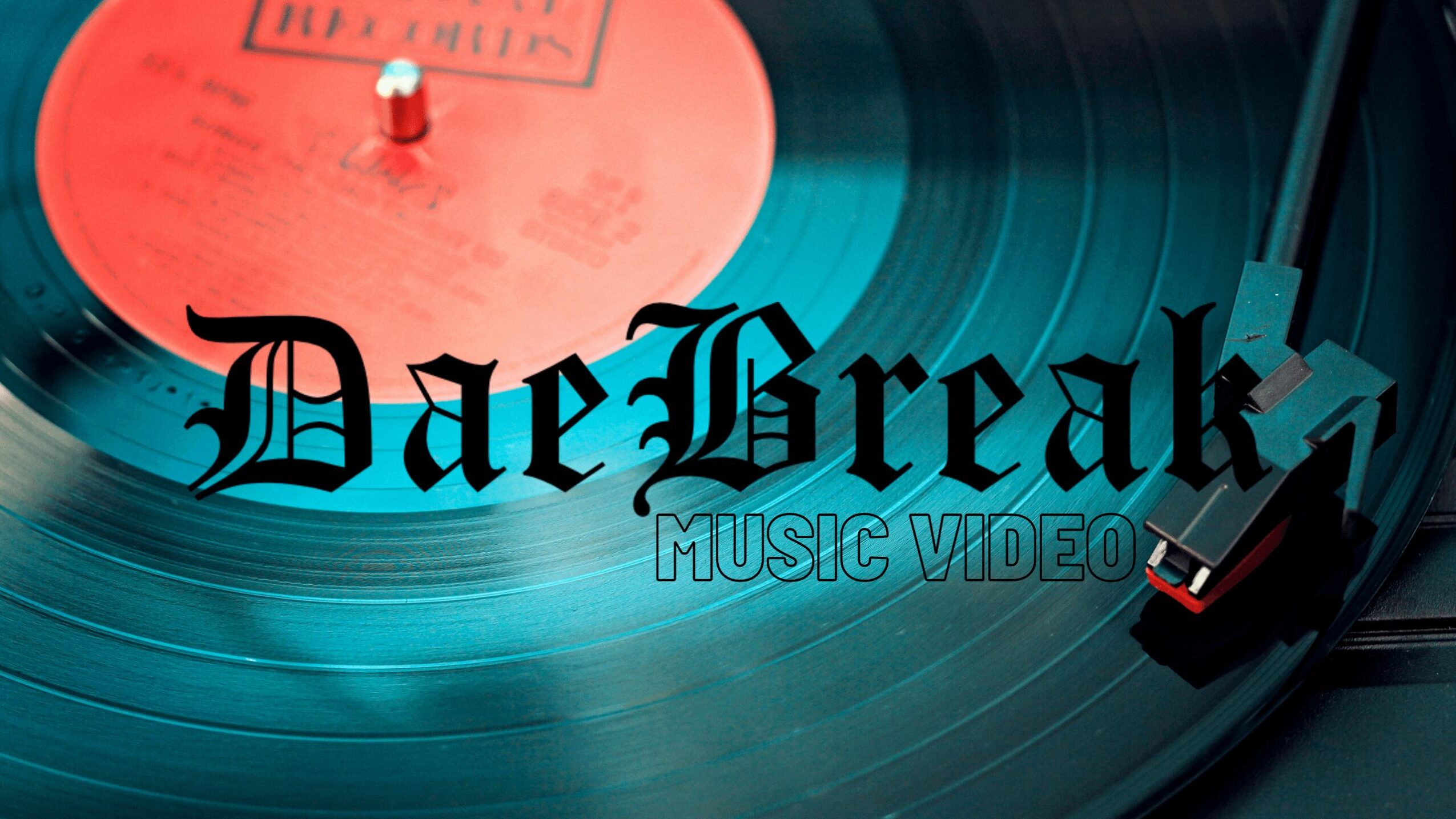 Close-up of a vinyl record spinning with a tonearm and stylus on the right, and text overlay reading 'Daebreak Music Video'.