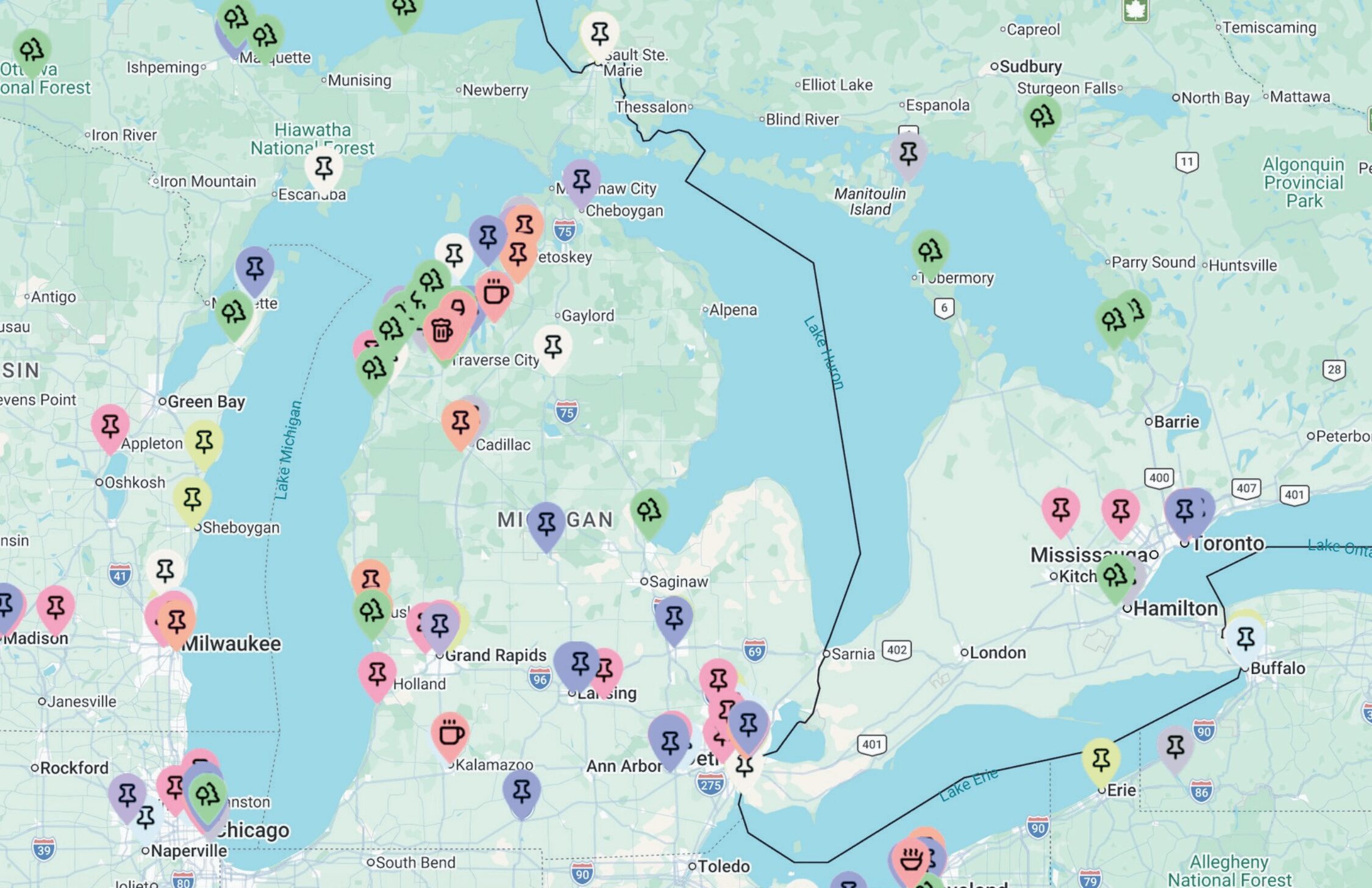 Map showing locations around Lake Michigan and surrounding areas with various colored icons, including cities and landmarks.