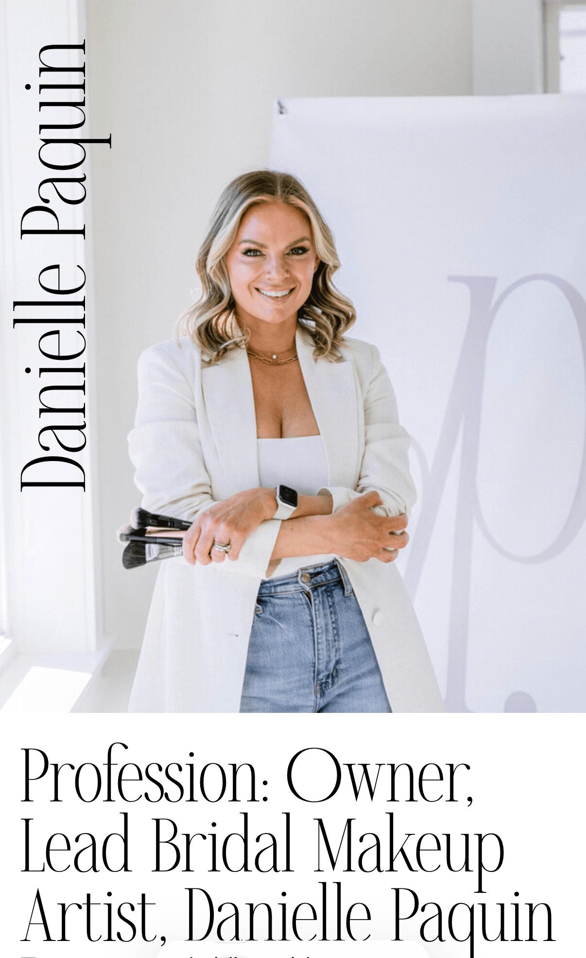 Woman with blonde hair smiling, wearing white blazer and jeans, standing in front of a white background with text. Alt text word count: 20. Confidence: 0.95