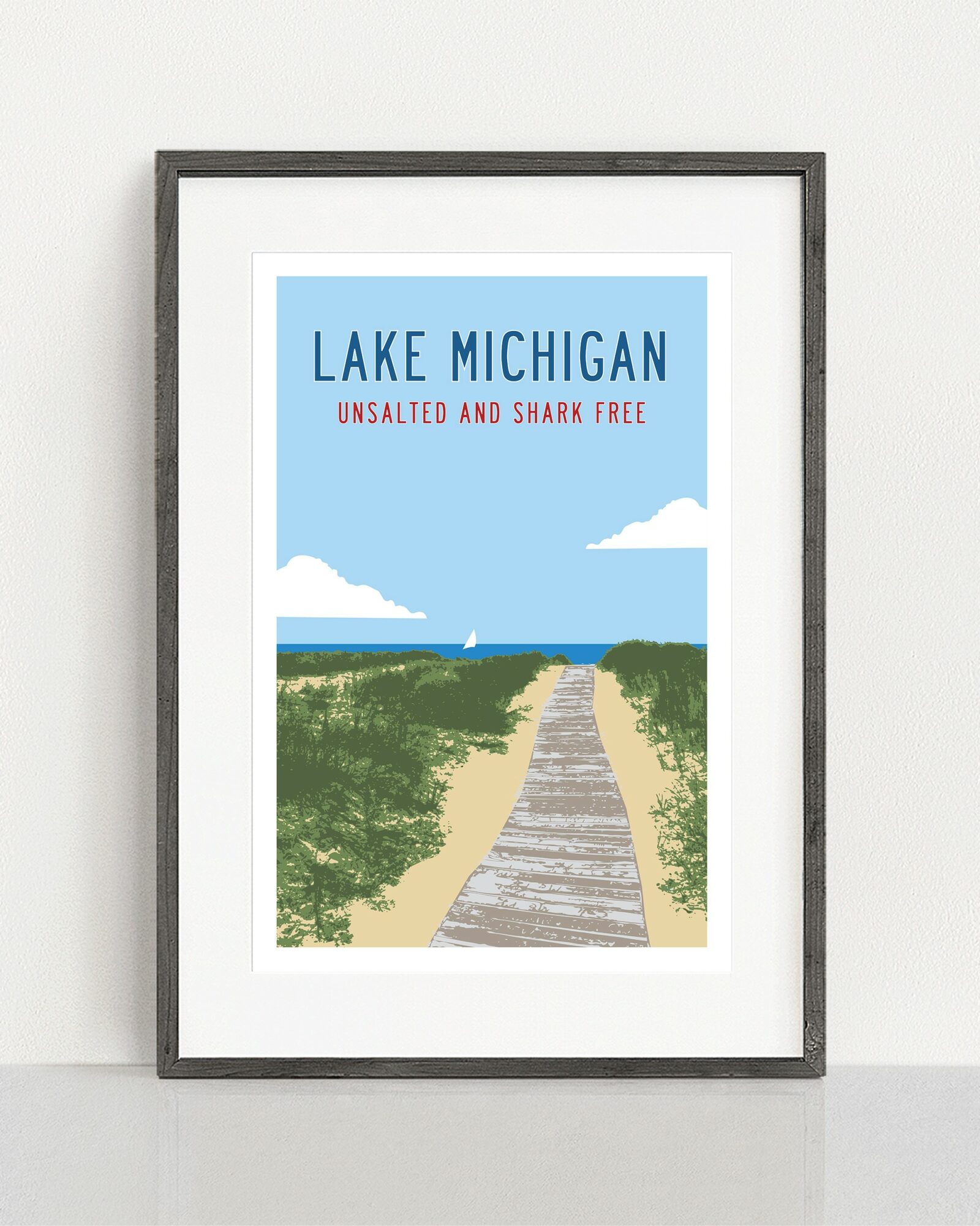 Framed poster of Lake Michigan with a wooden path leading to the water, blue sky, and green landscape.