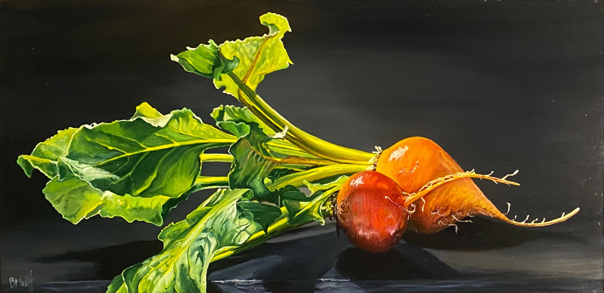 Three root vegetables with green leaves, one orange, one red, and one yellow, on a dark background.