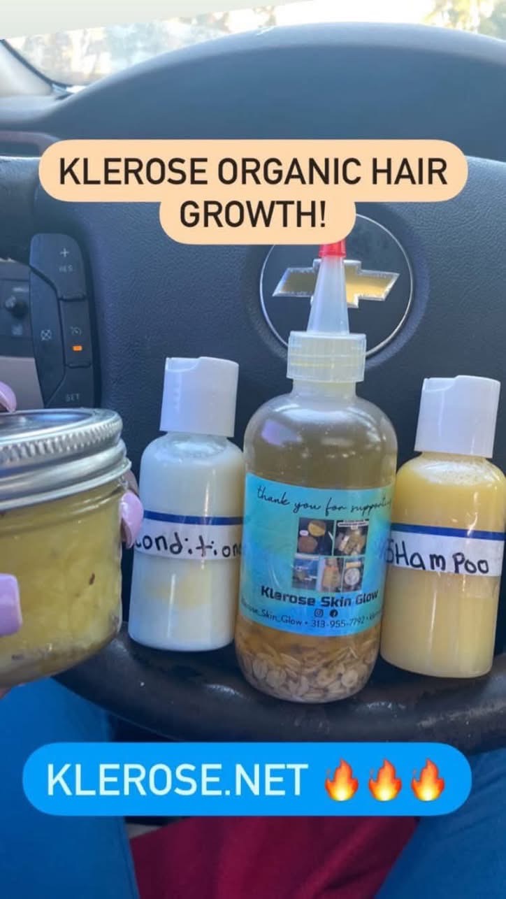 Various bottles and containers on a car dashboard, including a spray bottle, a jar, and a shampoo bottle, with text about hair growth.