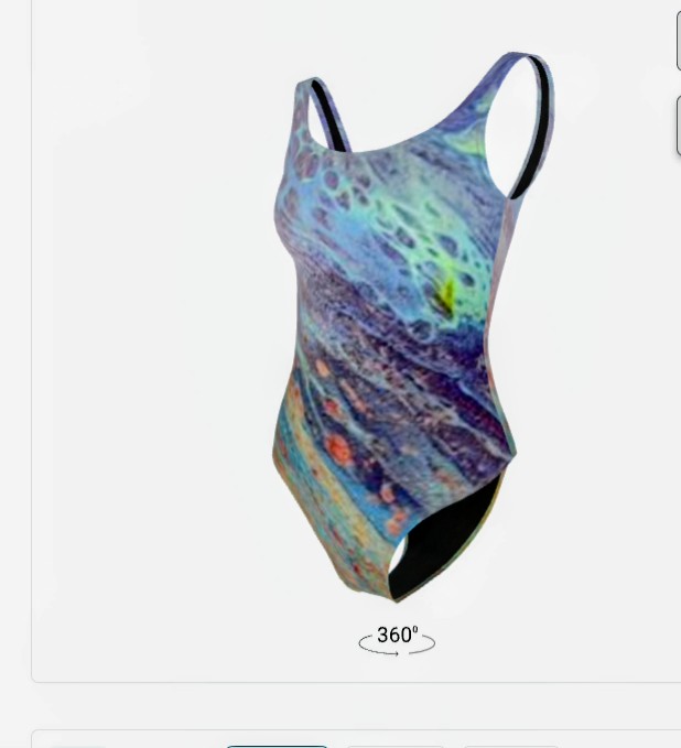 Swimsuit with a colorful abstract pattern, featuring shades of blue, green, and orange, with black straps and leg openings.