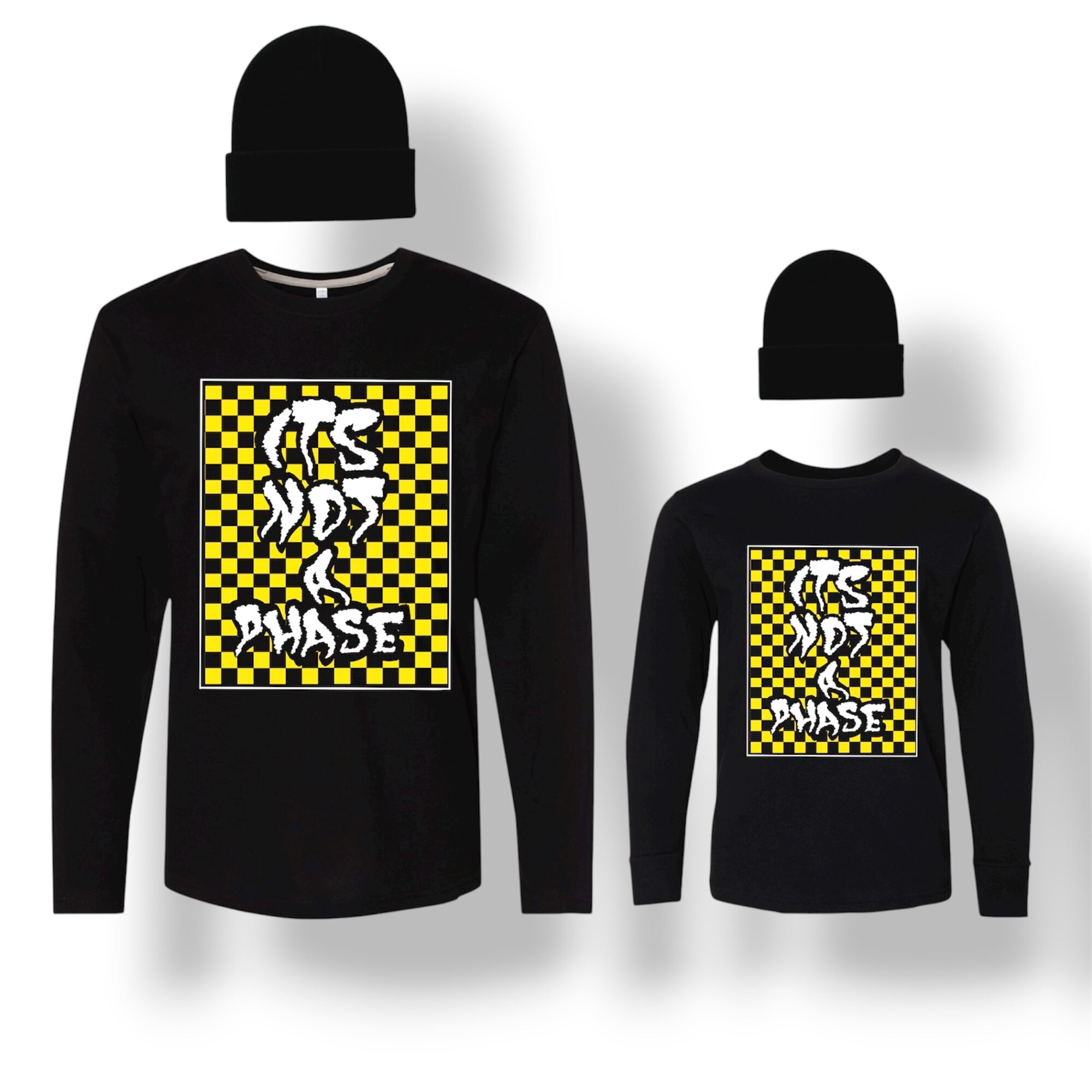 Two black long-sleeve shirts with yellow and black checkered graphic and text, displayed on mannequins with black hats.
