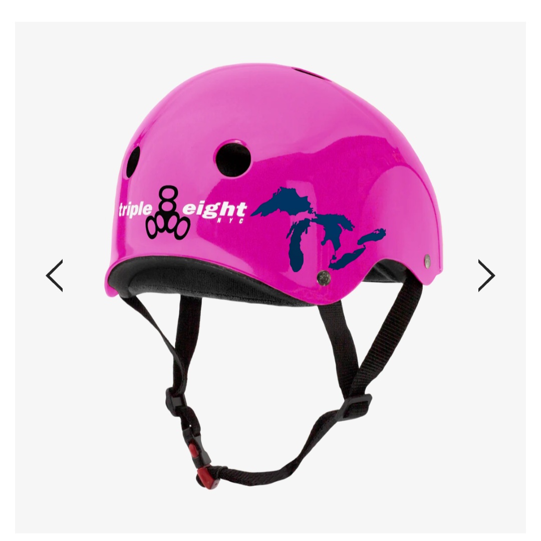 Pink helmet with black straps, a Michigan map silhouette, and text reading 'triple eight' and 'mo'.