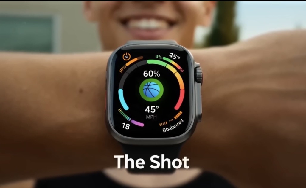 Close-up of a smartwatch on a person's wrist displaying health data, with a smiling person in the background.