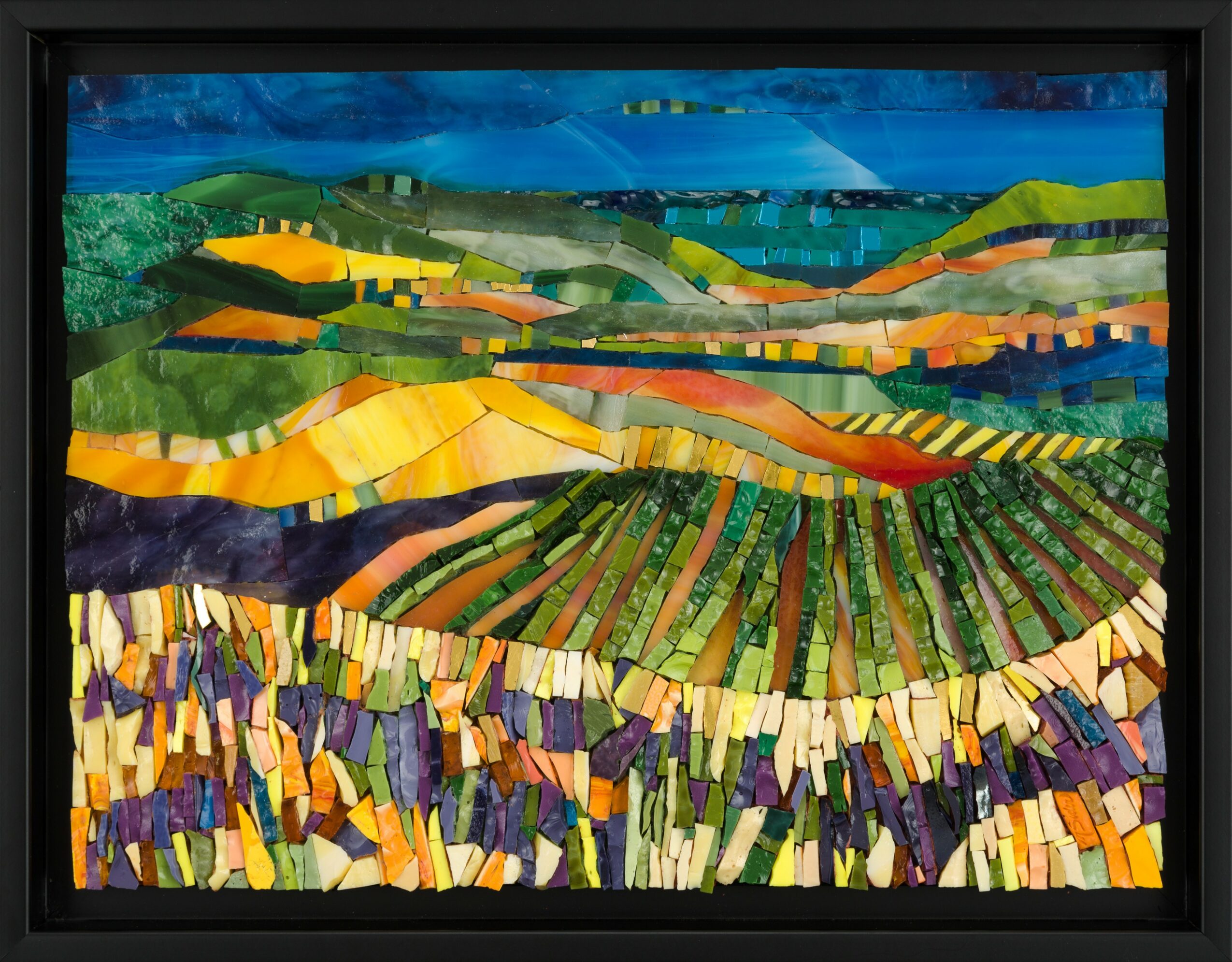 Colorful landscape painting of rolling hills, fields, and sky with vibrant, abstract shapes and patterns.