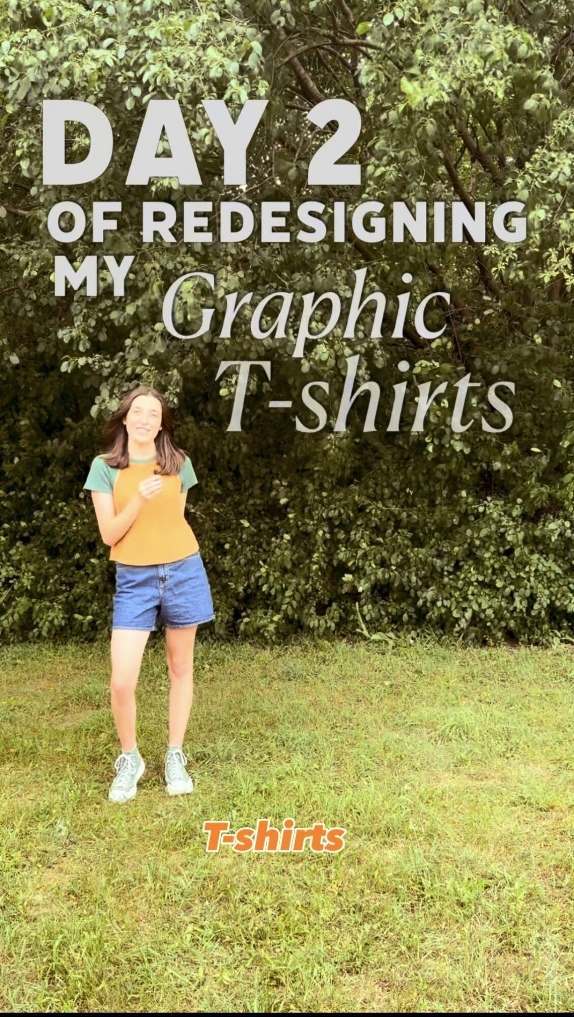 Person standing outdoors on grass with trees in background, holding a phone, text overlay about redesigning graphic T-shirts, 20 words.