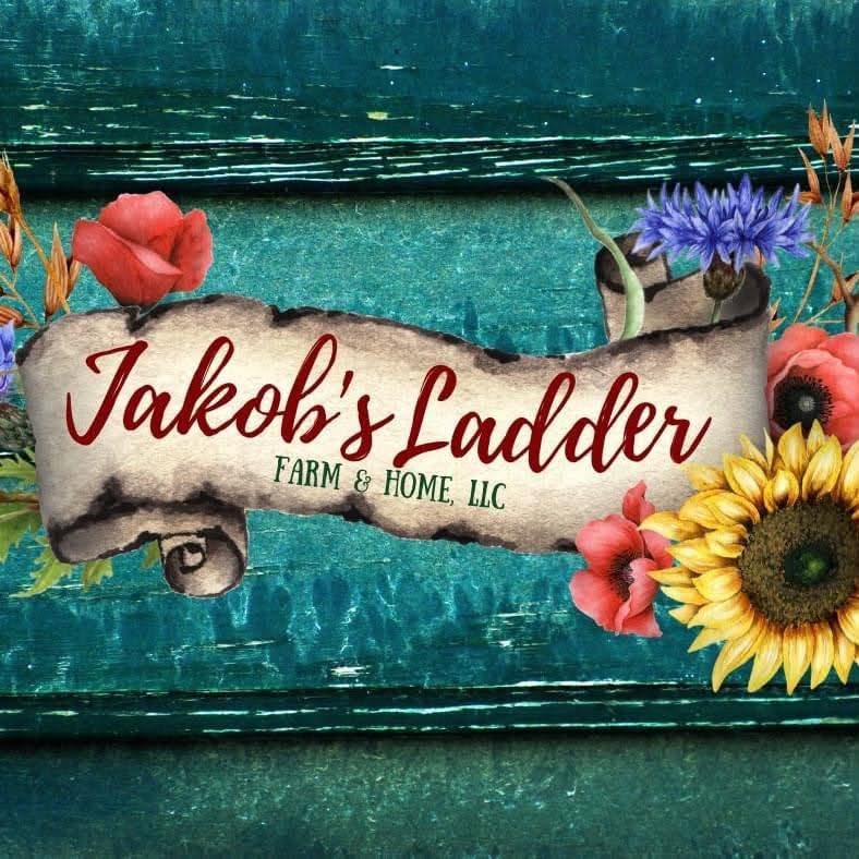 Colorful flowers surround a rustic sign with the text