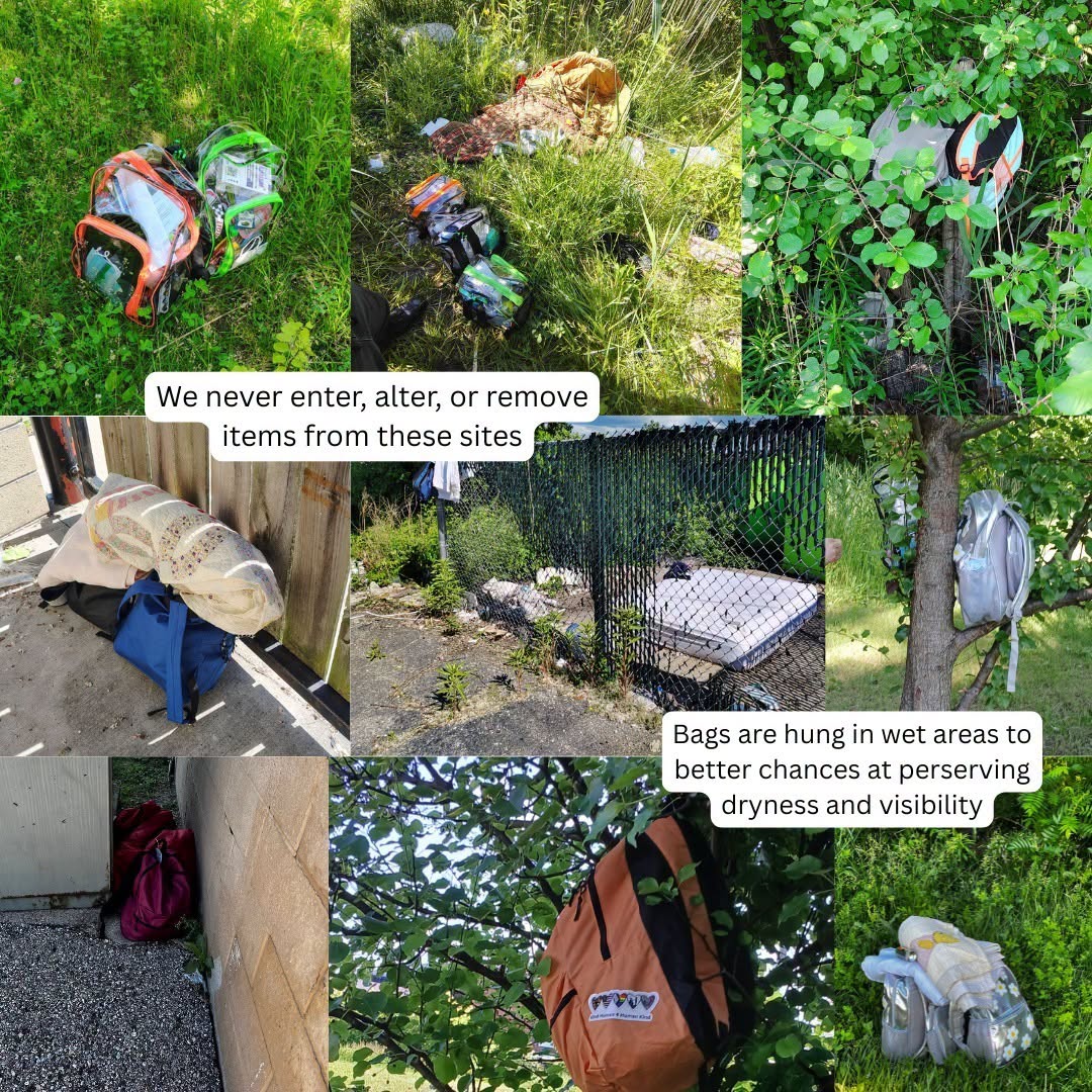Backpacks and bags hanging on trees, ground, and fence, with a bed and a sign about item removal, in outdoor setting.