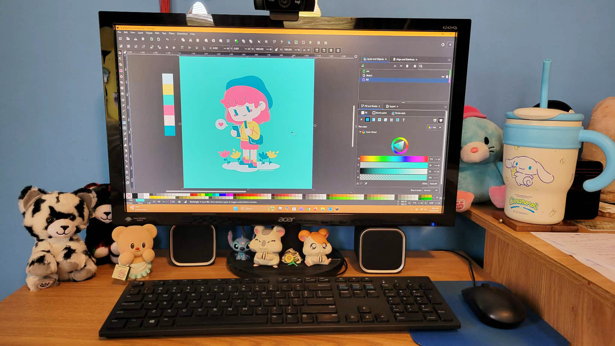 Computer monitor displays a colorful cartoon character with pink hair, surrounded by stuffed animals and a cup on a desk.