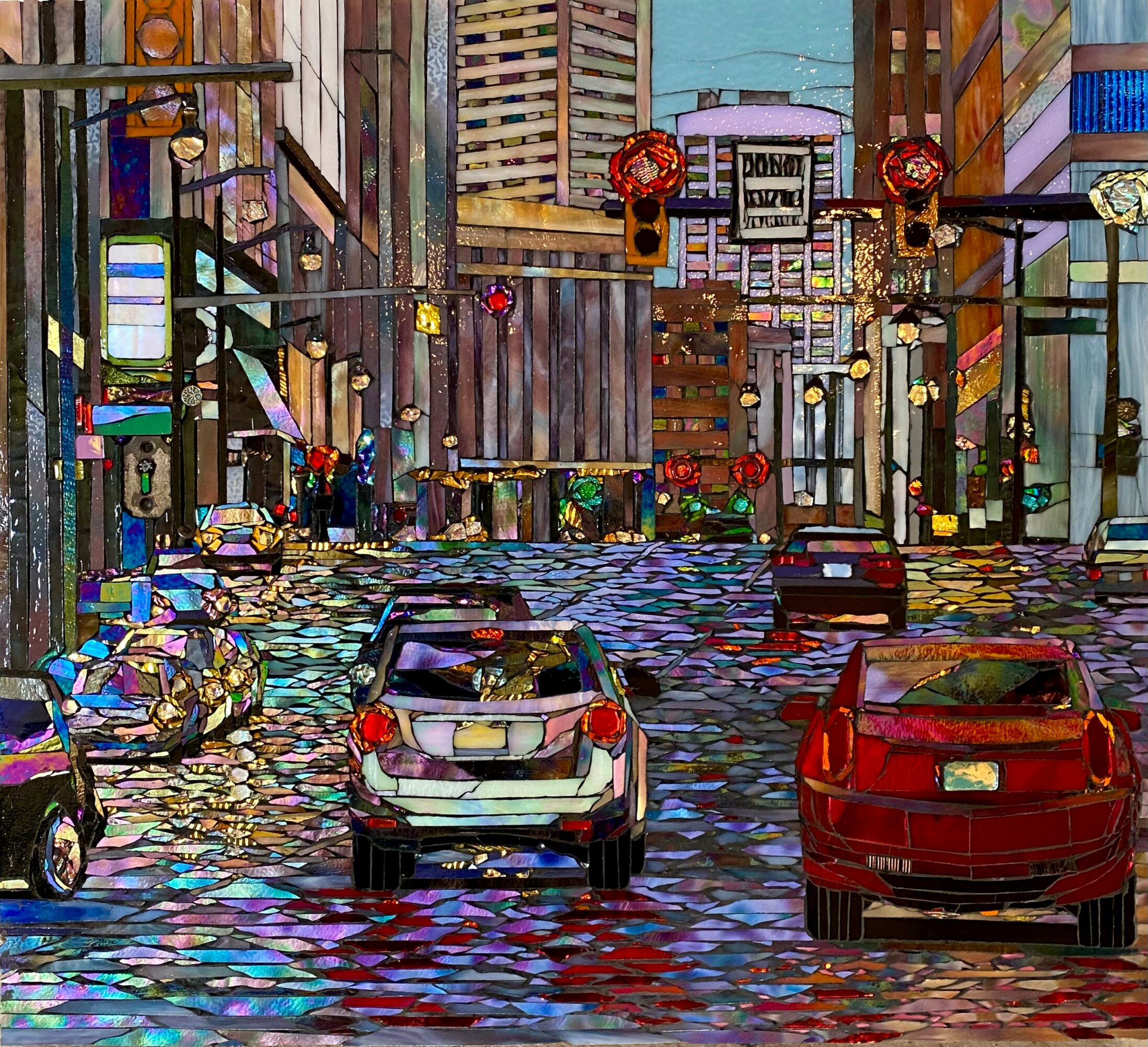 City street with cars, traffic lights, and buildings, depicted in a colorful, abstract, and stylized art style.