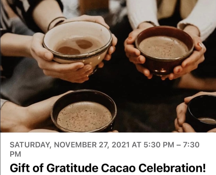 Four people hold bowls of cacao drink, with a dark table in the background. Text about a cacao celebration event.