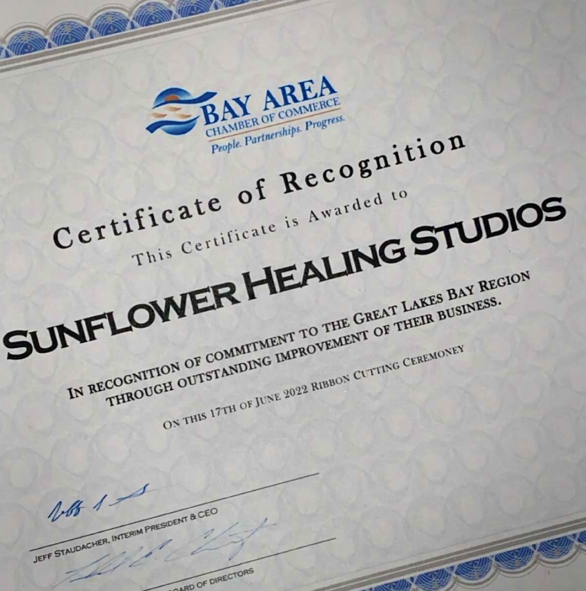 Certificate of recognition awarded to Sunflower Healing Studios by Bay Area Chamber of Commerce, with decorative border and text.