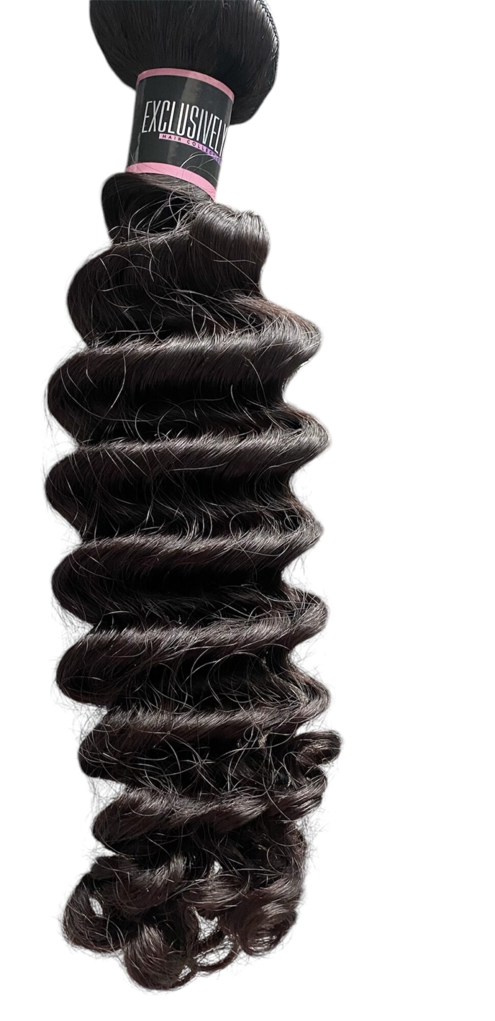Black curly hair extension bundle with pink and black label, viewed from the top.